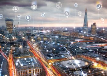 Skyline shot of London with lines running between buildings exampling an interconnecting professional network