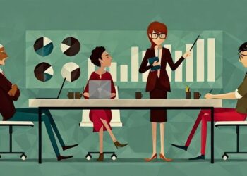 A business analyst relaying business intelligence information with a PowerPoint presentation to a team of colleagues