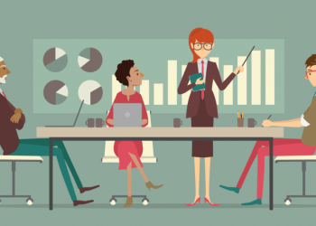 A business analyst relaying business intelligence information with a PowerPoint presentation to a team of colleagues