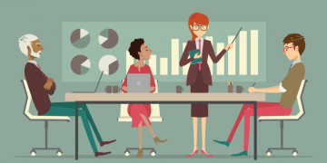 A business analyst relaying business intelligence information with a PowerPoint presentation to a team of colleagues