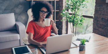 Social entrepreneur working on social enterprise at her desk