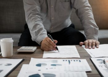 An entrepreneur valueing his business using a bunch of tools and analysis