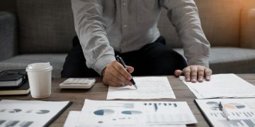 An entrepreneur valueing his business using a bunch of tools and analysis