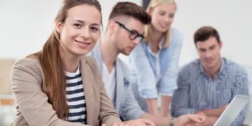 Several students and educators working together on an Enterprise project