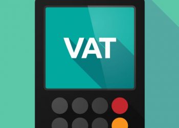 A VAT calculation being performed by a business owner
