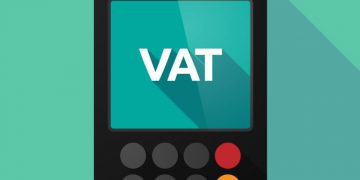 A VAT calculation being performed by a business owner