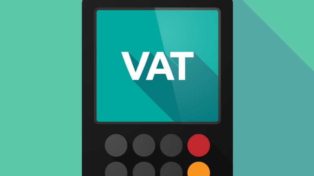 A VAT calculation being performed by a business owner