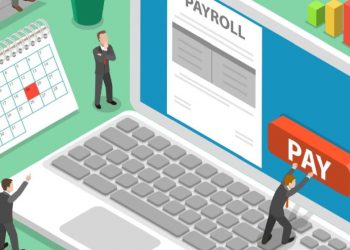 Tony businessman using a computer to calculate and make payroll payments to employees and the HMRC