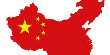 Graphic of China geographically in the Chinese colour red with the flag symbol imposed on the country