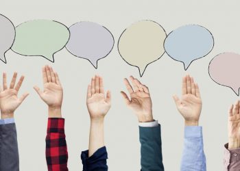 Employees and managers with raised hands and speech bubbles above them indicating they want to give feedback