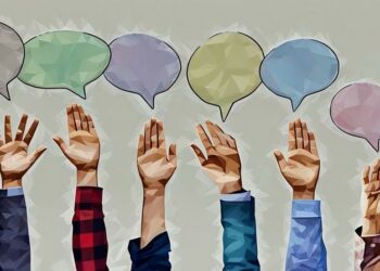 Employees and managers with raised hands and speech bubbles above them indicating they want to give feedback