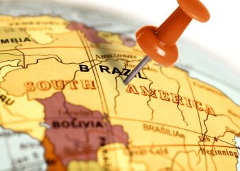 Brazil on a geographic map with a pin in it