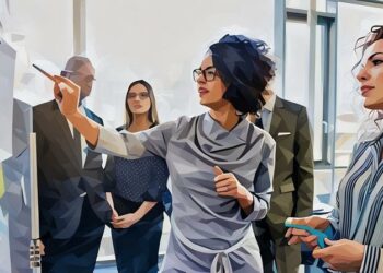 A female presenter showing her hidden public speaking and presentation techniques to colleagues