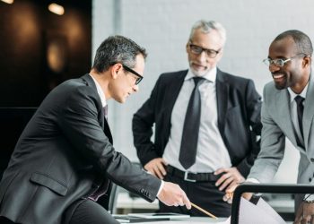 An intrapreneurial manager working with colleauges to innovate within a corporation