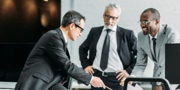 An intrapreneurial manager working with colleauges to innovate within a corporation