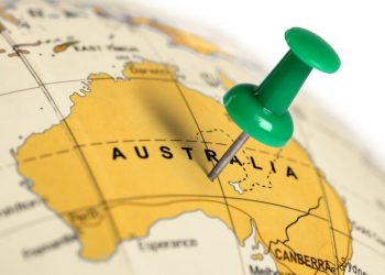 Geographic map of australia on globe with a green pin in where a venture capital firm is located