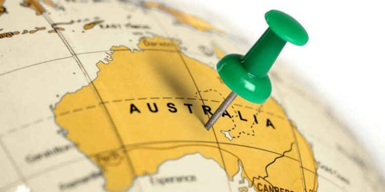 Geographic map of australia on globe with a green pin in where a venture capital firm is located