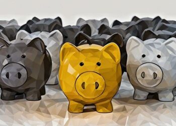 A series of piggy banks in grey with one highlighted in gold exampling the best business bank and account found