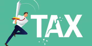 Entrepreneur using a sword to slice through the word tax, symbolsing how entrepreneurs can use tax reliefs to cut taxes arising from company sale