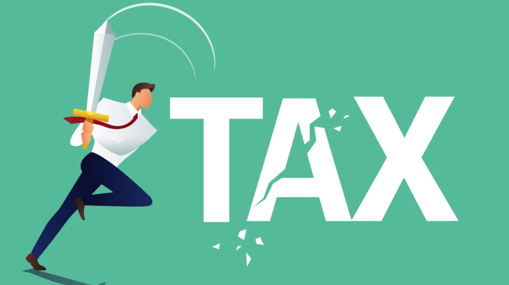 Entrepreneur using a sword to slice through the word tax, symbolsing how entrepreneurs can use tax reliefs to cut taxes arising from company sale