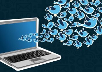 Twitter icons emerging from a piece of technology, symbolising tech entrepreneurs to follow on Twitter