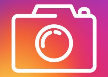 Instagram symbol of a camera outline on he purple and orange brand background