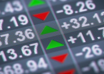 A stock quotation board showing share prices moving up and down exampling the dangers of an IPO (ie that share price can go up and down)