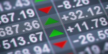 A stock quotation board showing share prices moving up and down exampling the dangers of an IPO (ie that share price can go up and down)