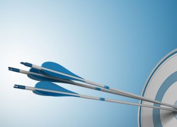 Arrows in the bulls-eye of a target, symbolising achieving marketing objectives