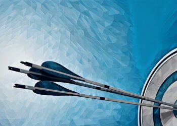 Arrows in the bulls-eye of a target, symbolising achieving marketing objectives