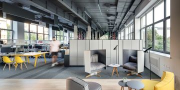 Coworking space with desks and seating areas in central London