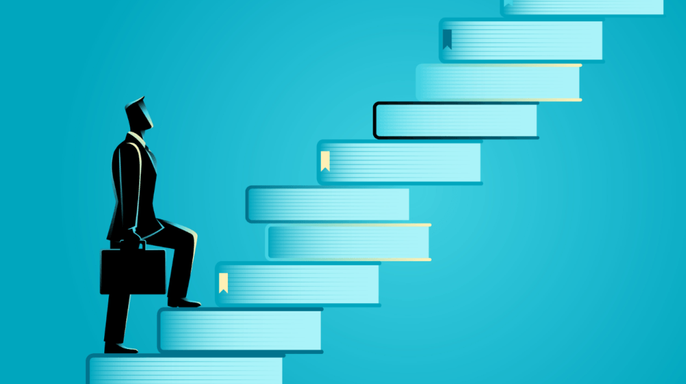 An entrepreneur starting a business by climbing the metaphorical steps of knowledge (books)