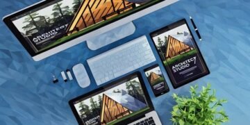 A website design shown on laptops, tablets and desktops - showing responsiveness of web design
