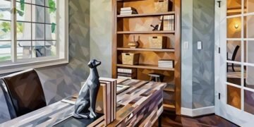 A perfectly set home office with a desk, office chair and dog statue