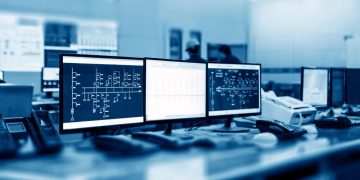 Closeup of computer systems running control software in a control room