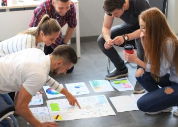 Students in a group planning to start a business at University