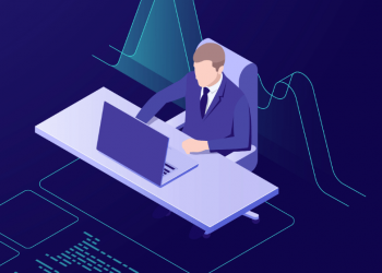 Digital marketer sitting at a desk using an online course to improve his marketing skills