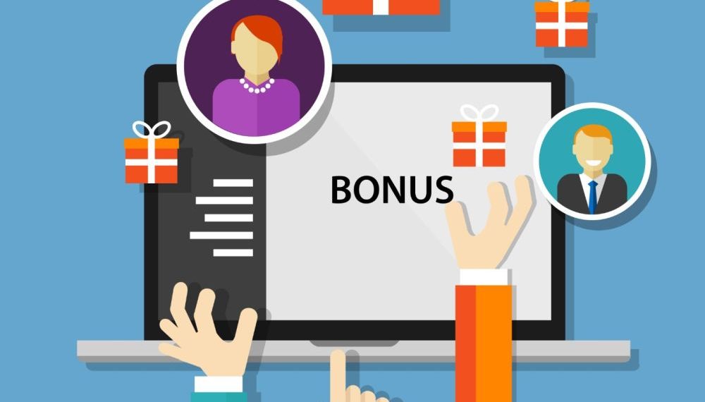 Presents surrounding a laptop and profile photos of employees, with bonus written on the laptop as an example of an employee benefits scheme feature