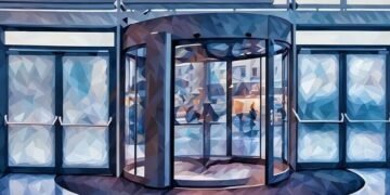 Revolving doors in motion leading to outside an office complex