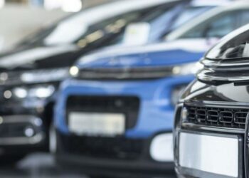 A series of cars with empty number plates as example of business vehicles ready to purchase