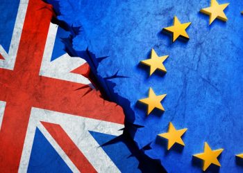 British and European flags meeting in the middle with a crack in between representing Brexit