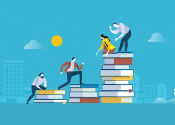 A team of learning management system employees working together to help each other climb a set of books, a metaphor for working together to achieve an LMS marketing strategy