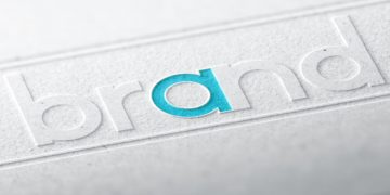 The word brand on a piece of paper, demonstrating how easy to it can be to rebrand
