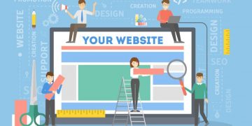 Cartoon people building a website on a desktop computer