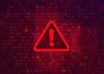 Warning sign across image of data as an example of cyber threats