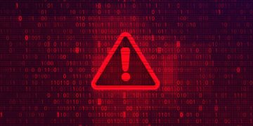 Warning sign across image of data as an example of cyber threats