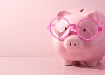 A piggy bank with glasses as a symbol for where to put your small business grant funding