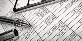 A spreadsheet showing monies owed in the form of invoices to a business owner, considering invoice discounting as a solution