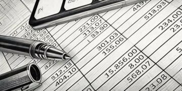 A spreadsheet showing monies owed in the form of invoices to a business owner, considering invoice discounting as a solution
