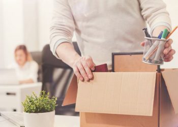 A dismissed employee gathering things and leaving the premises after constructive dismissal proceedings